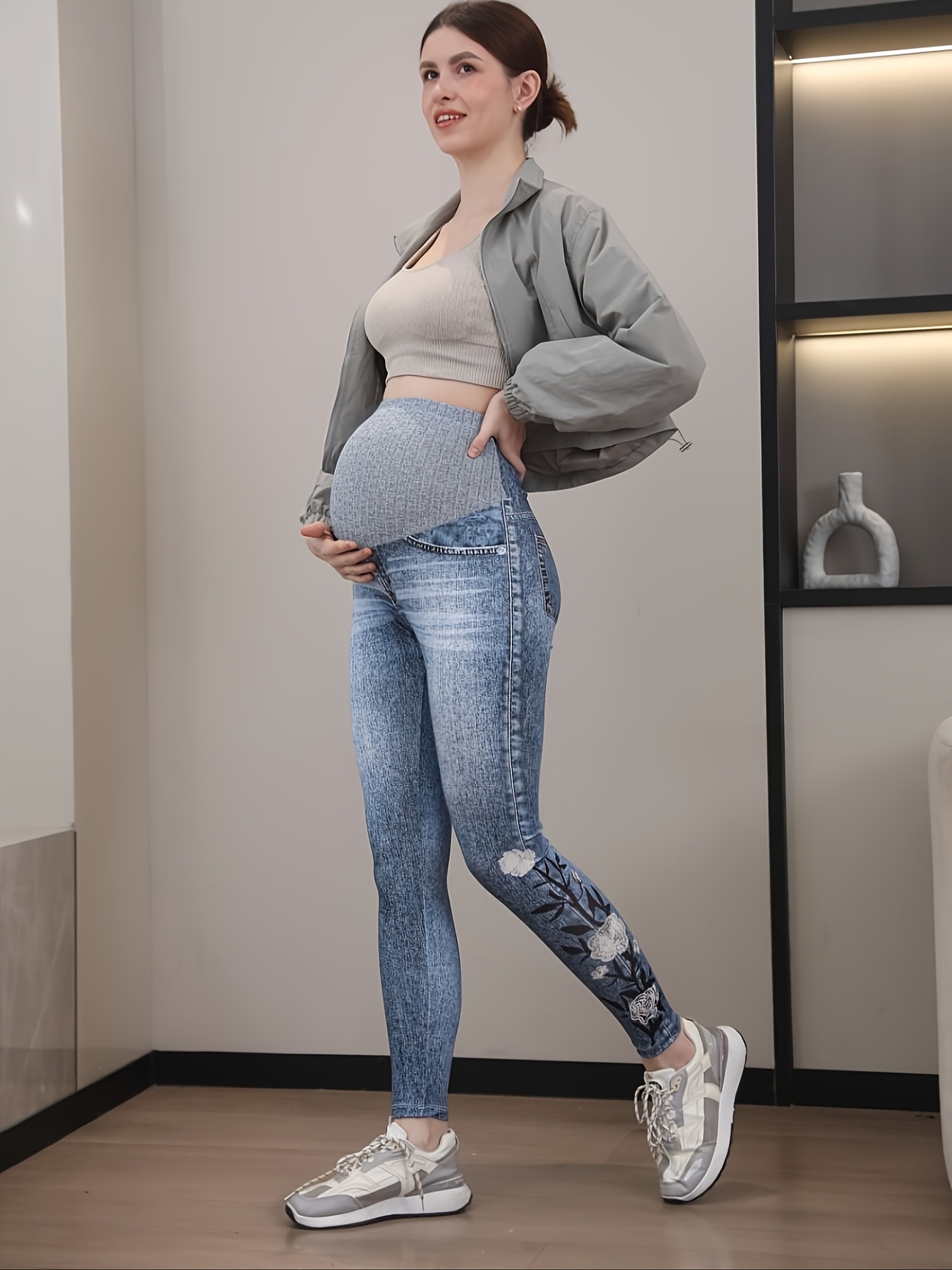 Stylish Maternity Leggings Featuring a Faux Denim Print with White Rose Patterns on The Calves.